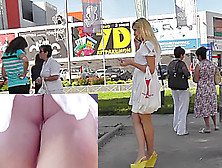 Sexy Blonde In White Dress Lures Up Skirt Camera