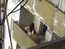 Voyeur Couple Fucks On The Balcony