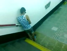 Couple Piss In Tunnel