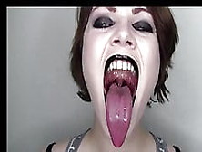 Glossy Black Lips And Dripping Wet Tongue Mouth Fetish