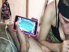 Slutty Wife Blows Her Husband While He's Busy Playing Video Games
