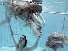2 Clothed Beauties Underwater Netrebko And Poleshuk