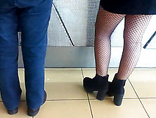 Sexy Legs In Fishnet In Airport