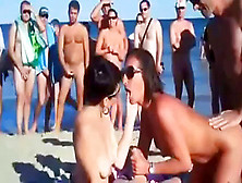 Four Mates Have Fuckfest On Bare Beach In Front Of Crowd