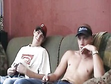More Mature Gay Guy And His Twink Friend Sit On A Couch And Masturbate Together