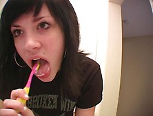 Andi Brushes Her Teeth And Sticks Out Her Tongue