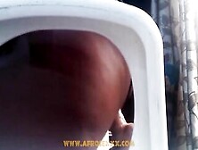 Ebony With Mini Skirt Fucks Herself With A Vibrator On The Chair