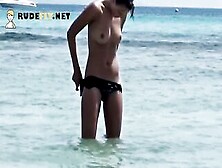 Young Nudist With Perky Titties Is Joined By A Lovers On The Beach