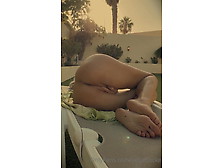 Horney Masturbates At Hotel Pool In The Sun