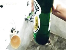 Wc Bimbo Gets Beer Bottle Filled With Man Peeing,  To Swallow