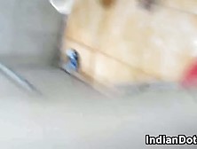 Pregnant Indian Cleaning A Bathroom