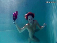 Sexy Underwater Teen Flashes Her Assets