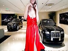 Thai Chick Stripping At The Luxury Cardealer....