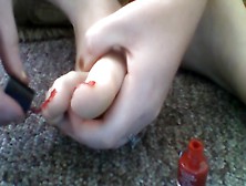 Painting Toes Red While Naked