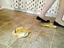Suzi Walks Over Unpeeled Bananas,  On Floor,  Wearing Her Black Ballet Flats