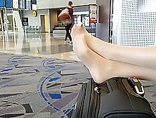 Nylon Feet At The Airport