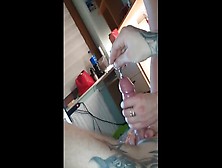Domina Sounding His Cervix With Dilator