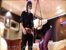 A Female Slave Hung With An Anal Hook And A Crotch Rope...  Sucking A Cock...  Thrusting Into A Pussy.  Continue At The Fan