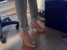 Candid Heels Under Table In Office 1