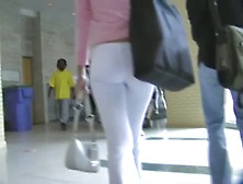 Fit Brunette In White Skintight Pants Walks In A Student Hall Candid Porn