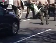 7 Officers 1 Naked Man
