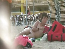 Short Haired Sweetie Filmed On A Nudist Beach