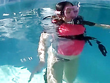 Pregnant Dives Underwater