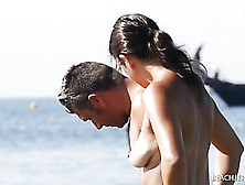 Topless Wife And Her Man Hanging Out At The Beach