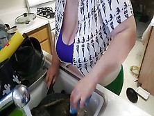 Big Beautiful Woman Cleaning The Kitchen
