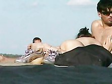Couple Cuddling Naked On The Nudist Beach On Spy Cam