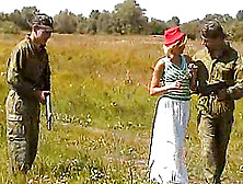 Soldiers Tag Team A Chick While On Patrol In A Field