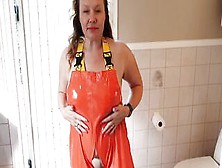Lusty Mom Dressing Up Into Rainpants - Oiling Big Boobies