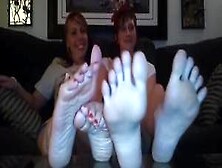 Short Hair Girl And Blondie Friend Showing Her Feet And Playing With Them