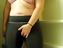 Wetting Her Yoga Pants Close Up