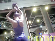 Brunette Chick With Nice Ass Exercising In The Gym