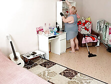 Mother-In-Law Vacuums The Room Naked