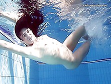 Gypsy Black Haired Babe Swimming Underwater
