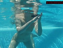Steamy Small Teen Mia Ferrari Strips Naked In Pool