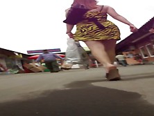 Voyeur Upskirt Pono Video Of A Hot White Lady In Yellow/black Dress.