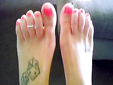 Gorgeous Brunette Exposing Her Wonderful Mature Feet With Pink Nail Polish On The Sofa