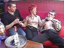 During A Party A Redheaded Milf Takes On Four Guys At Once