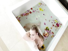 Scarlett Sage Satisfies Pussy In The Bathtub With Flowers