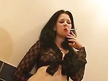 Horny Brunette Posing Sexy While Smoking Cigerette