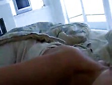 Busty Hottie Gives A Blowjob And Handjob In Bed