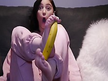 Peeling A Banana With Her Feet