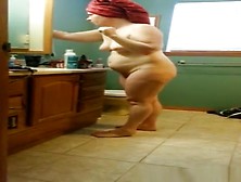 Mature Woman With Towel In Head