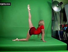 Sexy Red Dressed Gymnast Doing Spreads