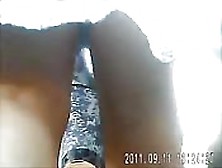 Voyeur Sneaks Around And Catches Some Upskirt Shots
