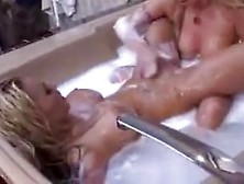 Two Blonde Lesbians In The Bath