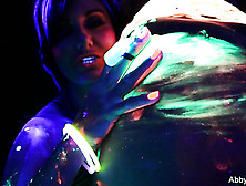Outstanding Strumpets Captured In Video At A Black Light Lesbian Photoshoot.